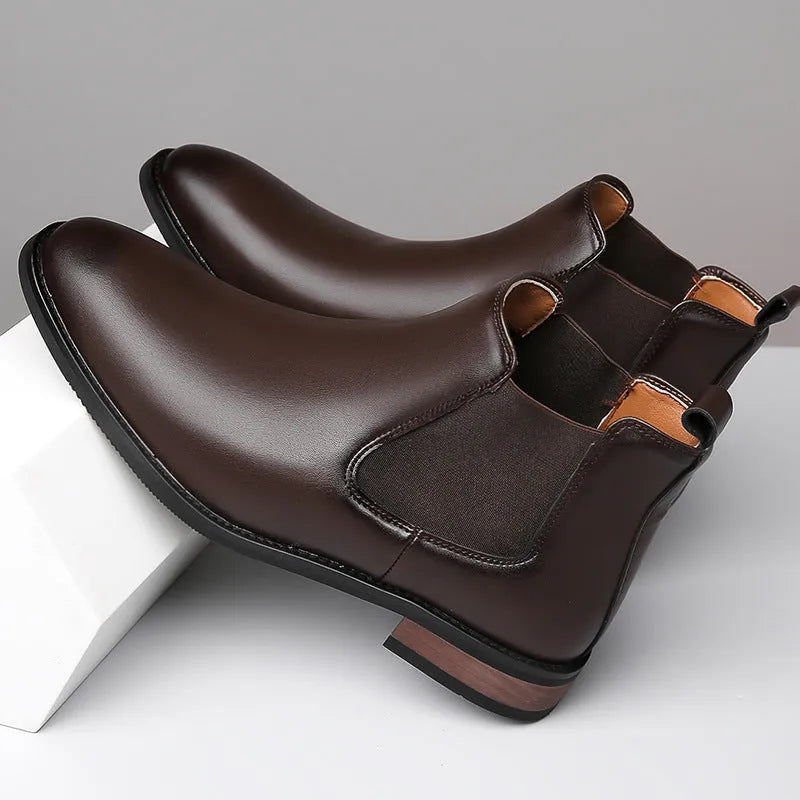 Men's black Chelsea boots with pointed toe and artificial PU leather upper on rubber sole