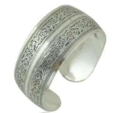 Ethnic carved open bracelet with Miao silver style in turtle colour showing Roman-inspired shape