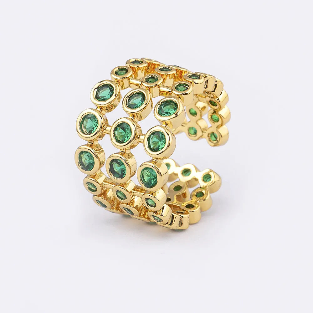 Copper ring with 18K gold plating and green zircon on exaggerated wide three-layer band