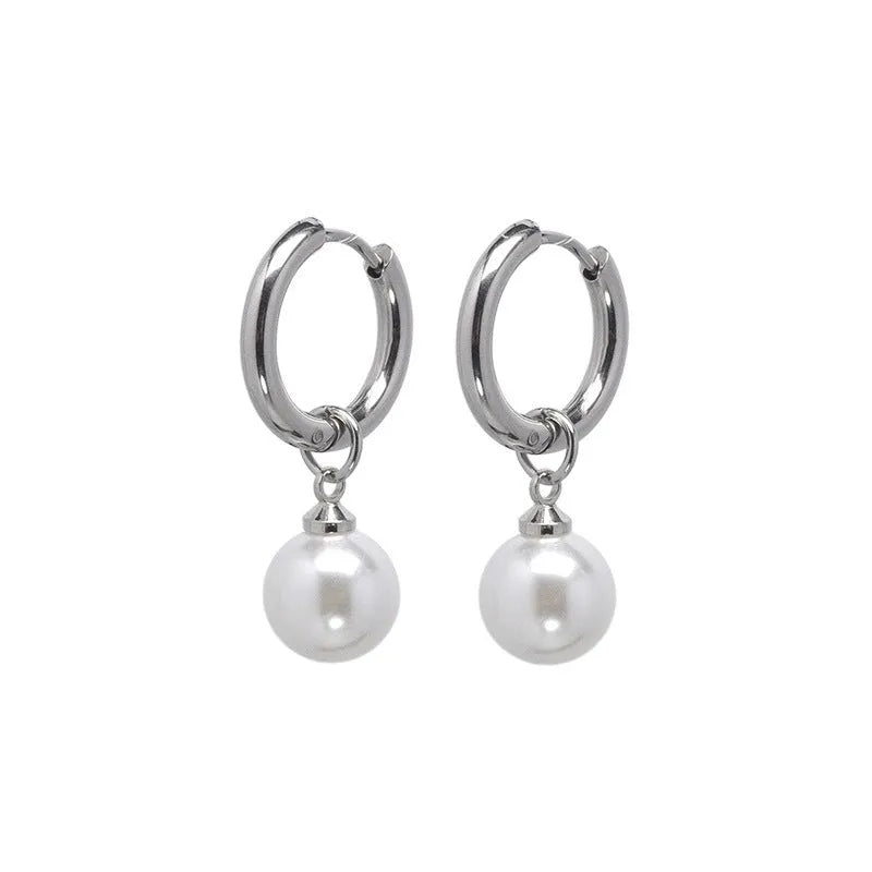 A pair of women's geometric drop earrings with a round pearl detail on alloy hooks.