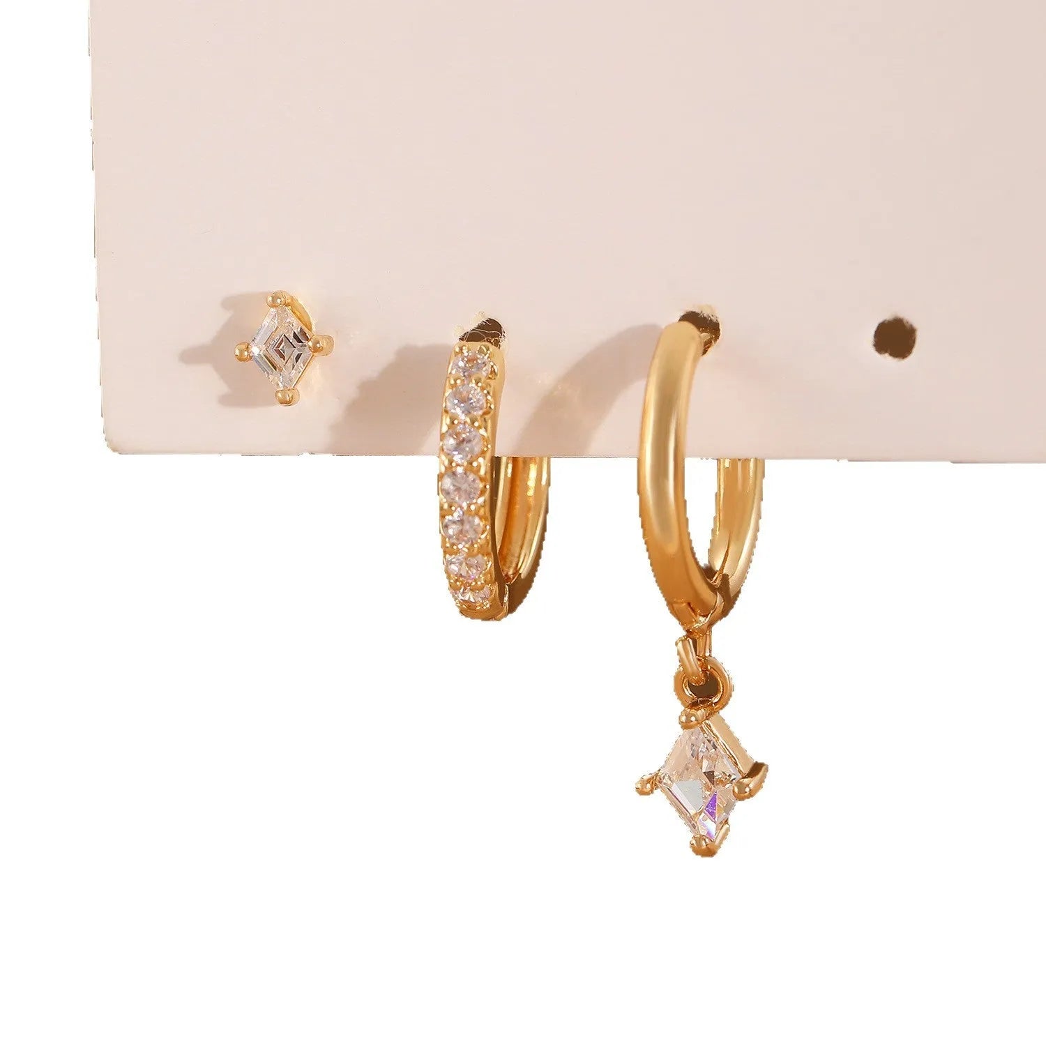 Ladies three-piece geometric earring set with zircon detailing in gold and white colours