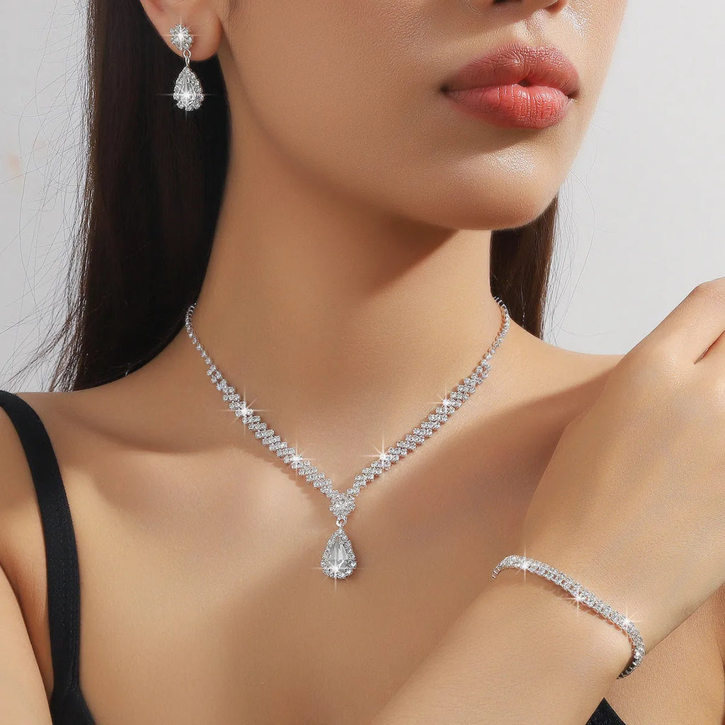 Claw chain necklace and matching earrings set with water drop rhinestone design in multiple colours