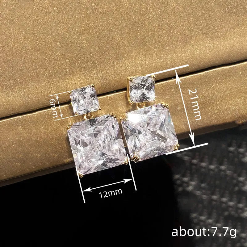 Geometric square copper earrings with quadrilateral ornament detail in white gold or gold tone finish