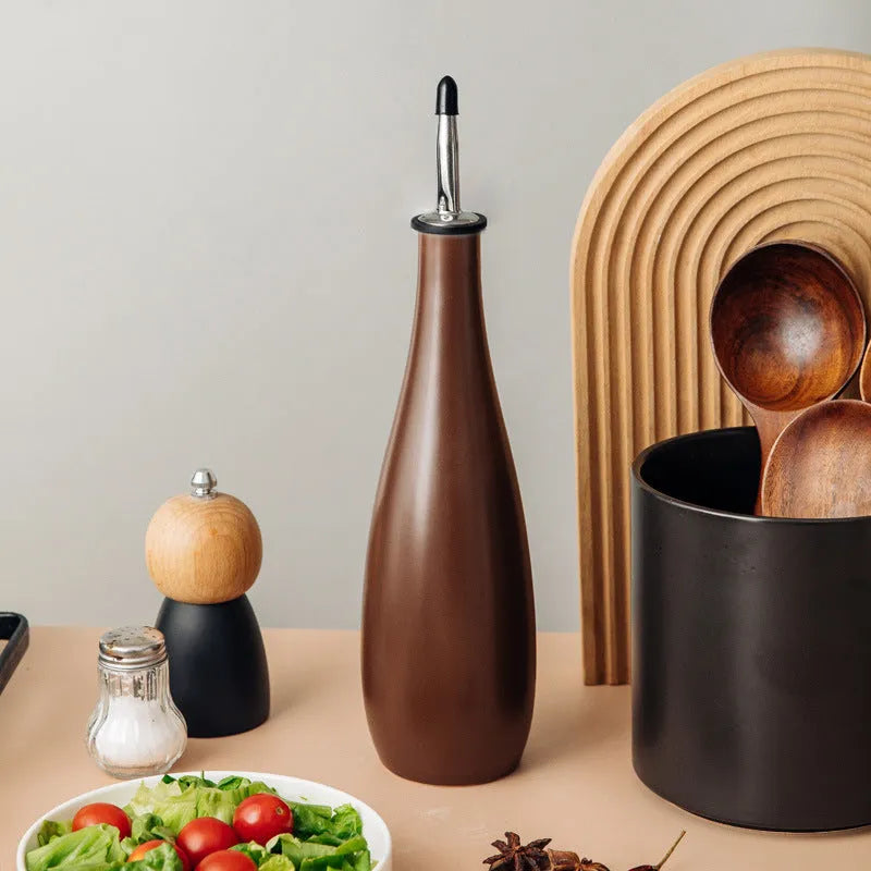 Ceramic oil pot with integrated brush and conical funnel design