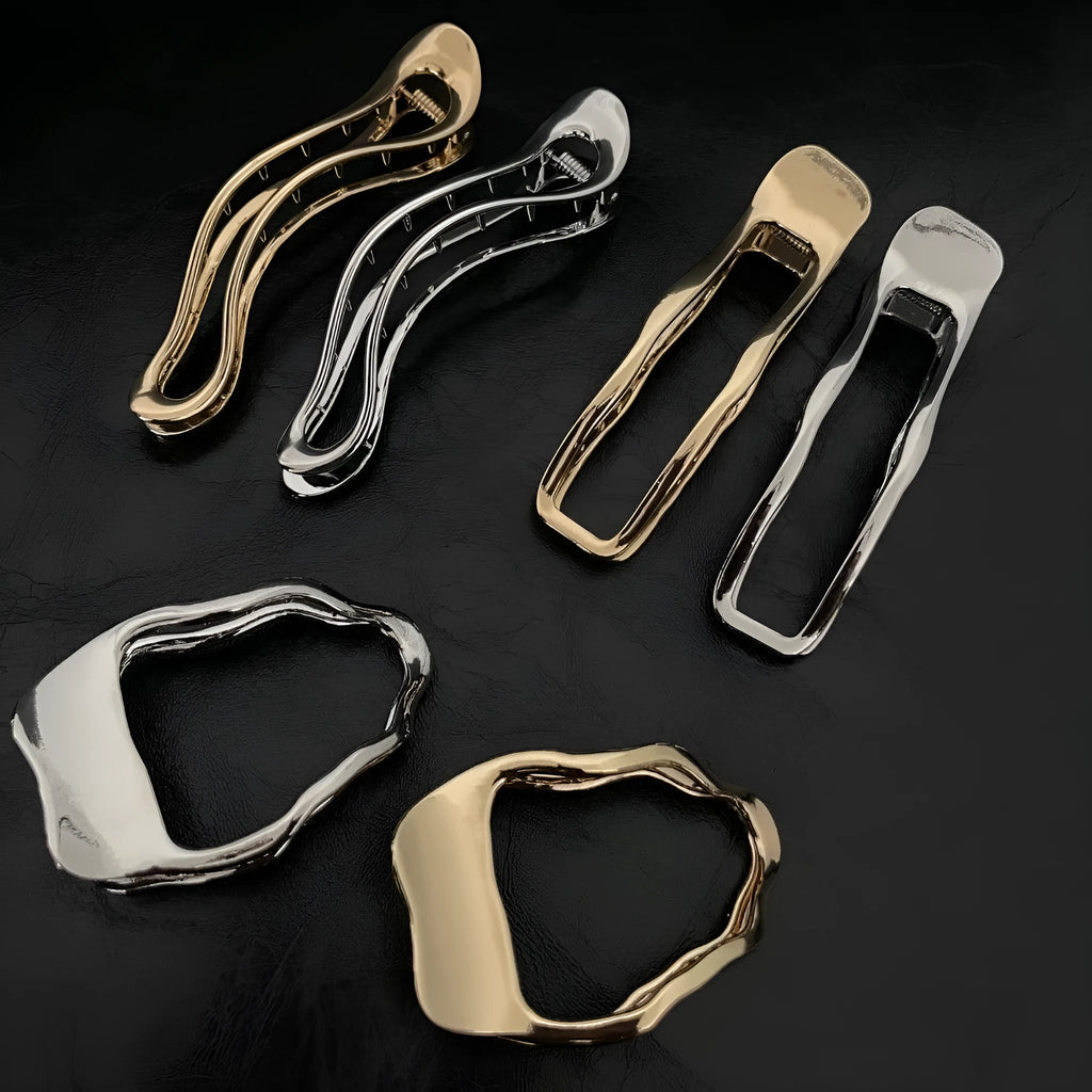 Women's zinc alloy barrettes in gold and silver finishes showing square, arc, and triangle shapes