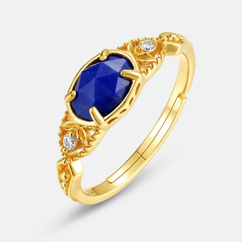 Japanese style geometric silver-tone alloy ring with a blue Lapis Lazuli ellipse stone.