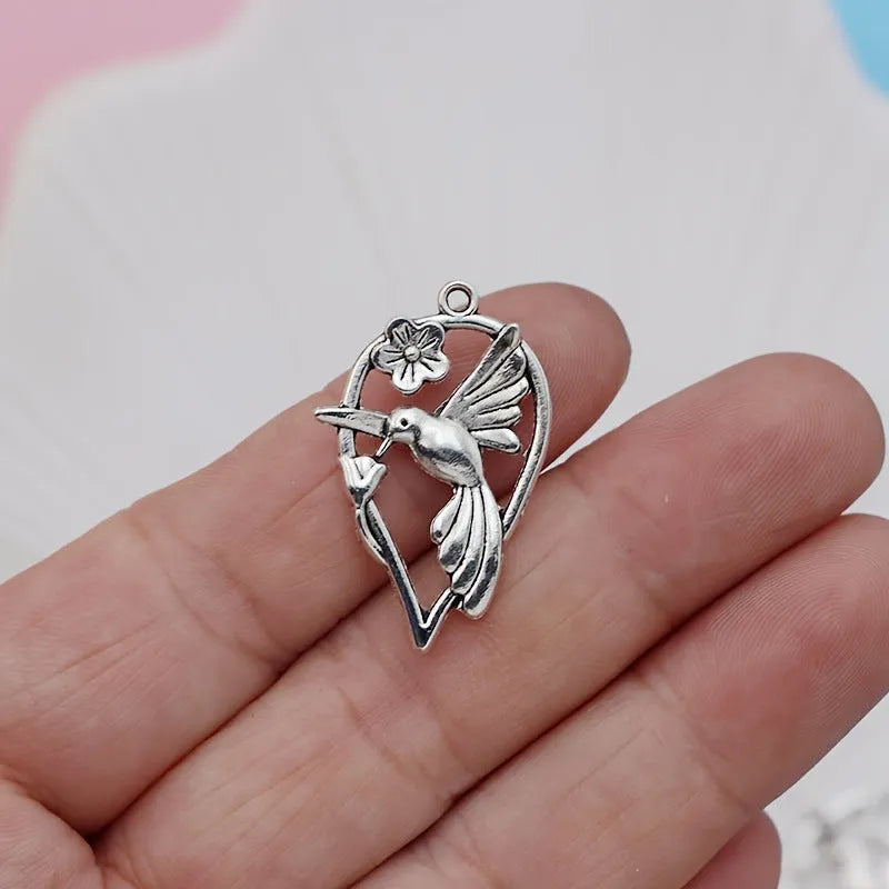 Alloy magpie bird pendant with electroplated finish in P234 colour for DIY jewellery making.