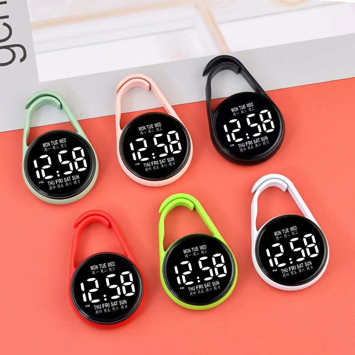 LED electronic watch with luminous week display in multiple colour options including black white pink green blue red grey