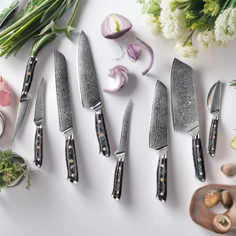 Eight-piece Damascus steel kitchen knife set with fishbone pattern, showing chef, utility, boning, steak, and fruit knives.