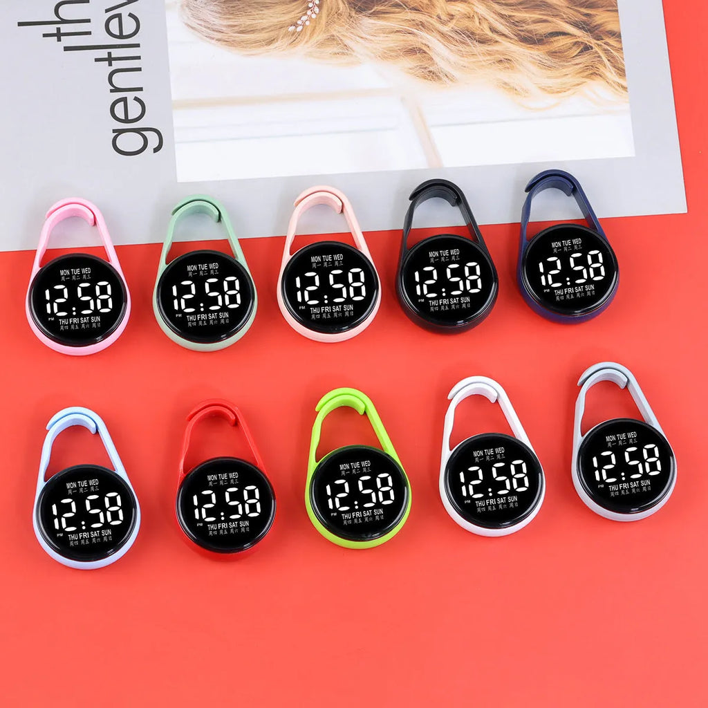 LED electronic watch with luminous week display in multiple colour options including black white pink green blue red grey