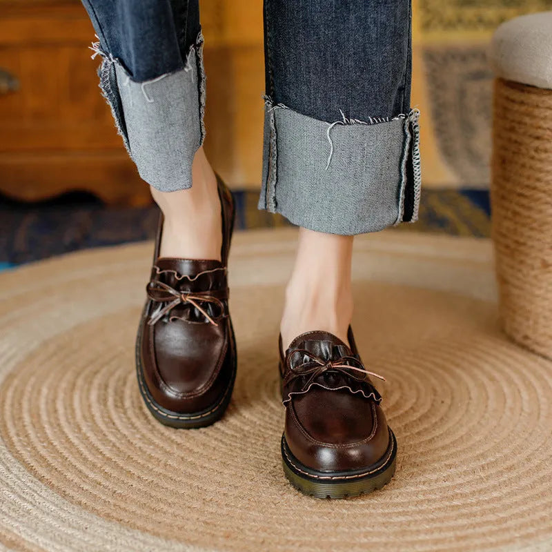 British style women's round head leather shoes with a chunky flat heel in black or brown.