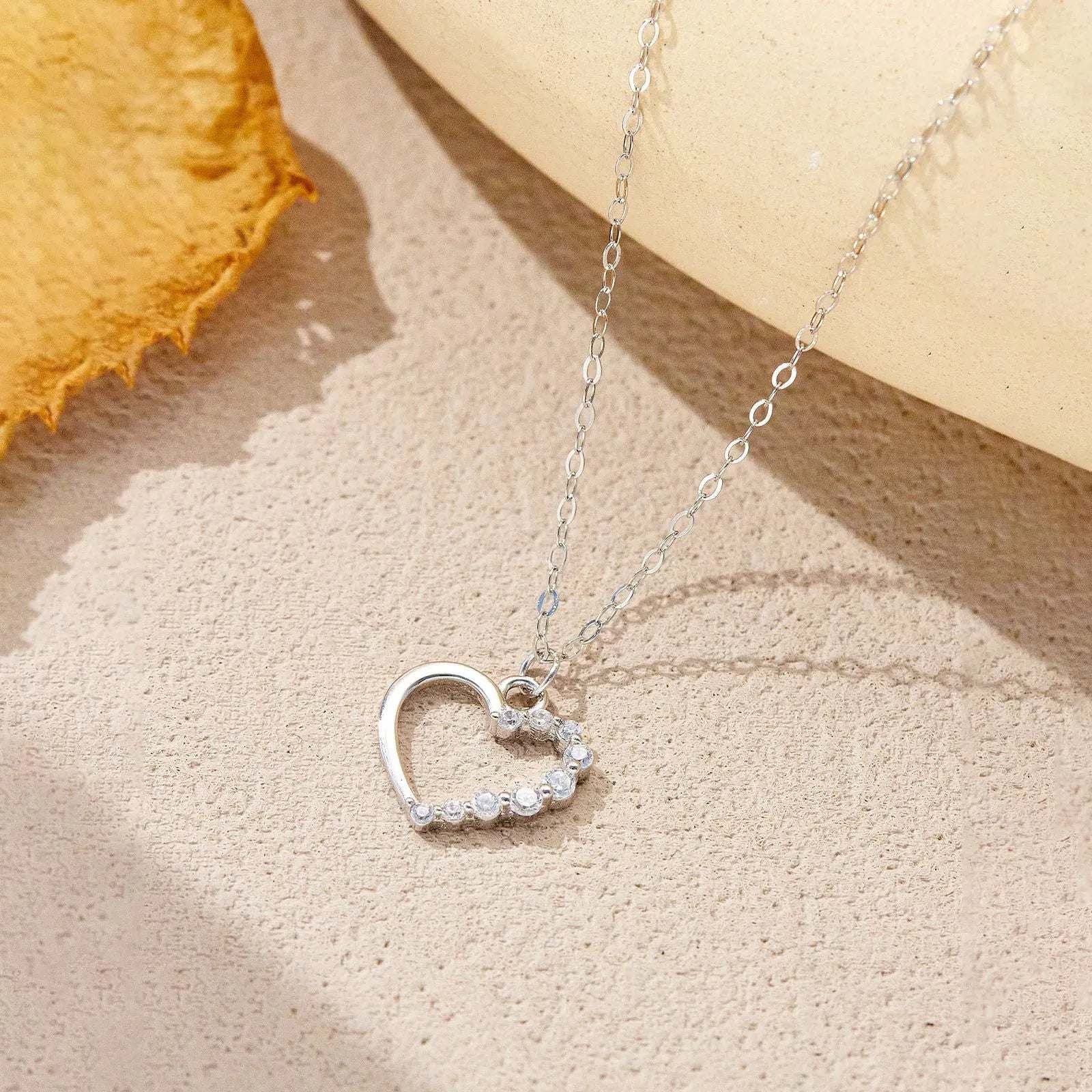 S925 sterling silver hollow heart and circle pendant necklace on a regular chain.