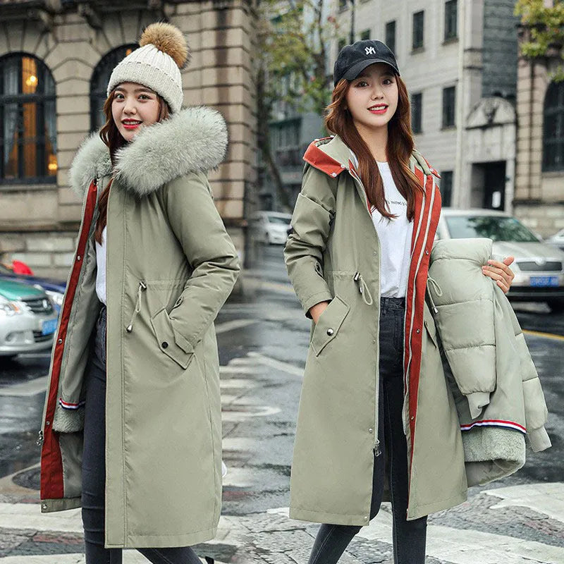 Women's white cotton-padded trench coat with two-way zip showing extended 100cm length and long sleeves