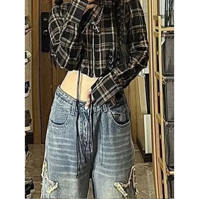 Blue women's high-waist straight-leg jeans on a neutral background.