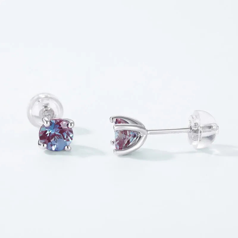 A pair of simple geometric ear studs for women in cultivated Alexandrite colour, made from 925 silver.