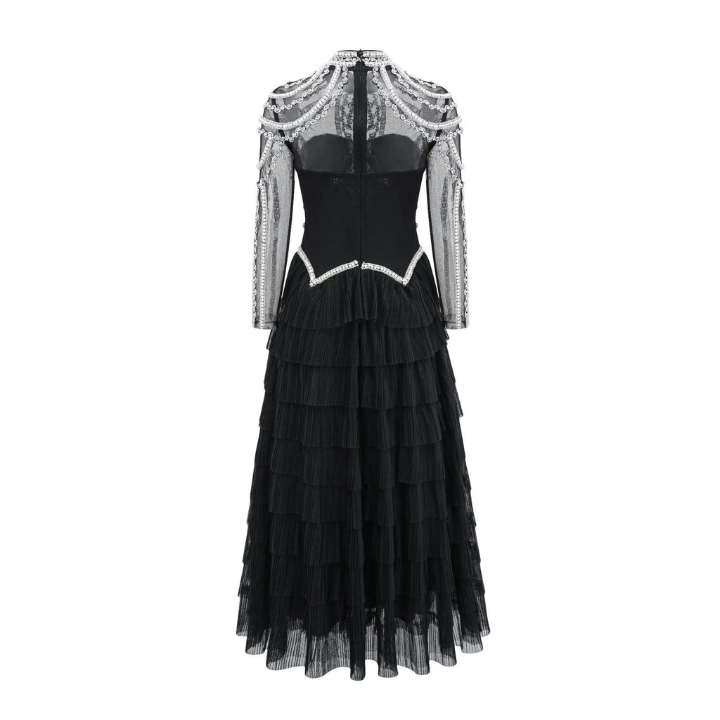 Women's black polyester dress with long sleeves and detailed beaded decoration on the bodice