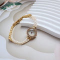 Women's light gold bracelet watch with natural freshwater pearls and 18mm round dial