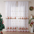 White Christmas curtain with embroidered blue snowflake pattern showing textured embroidery detail