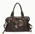 Women's brown French retro motorcycle messenger bag with woven decoration and shoulder strap