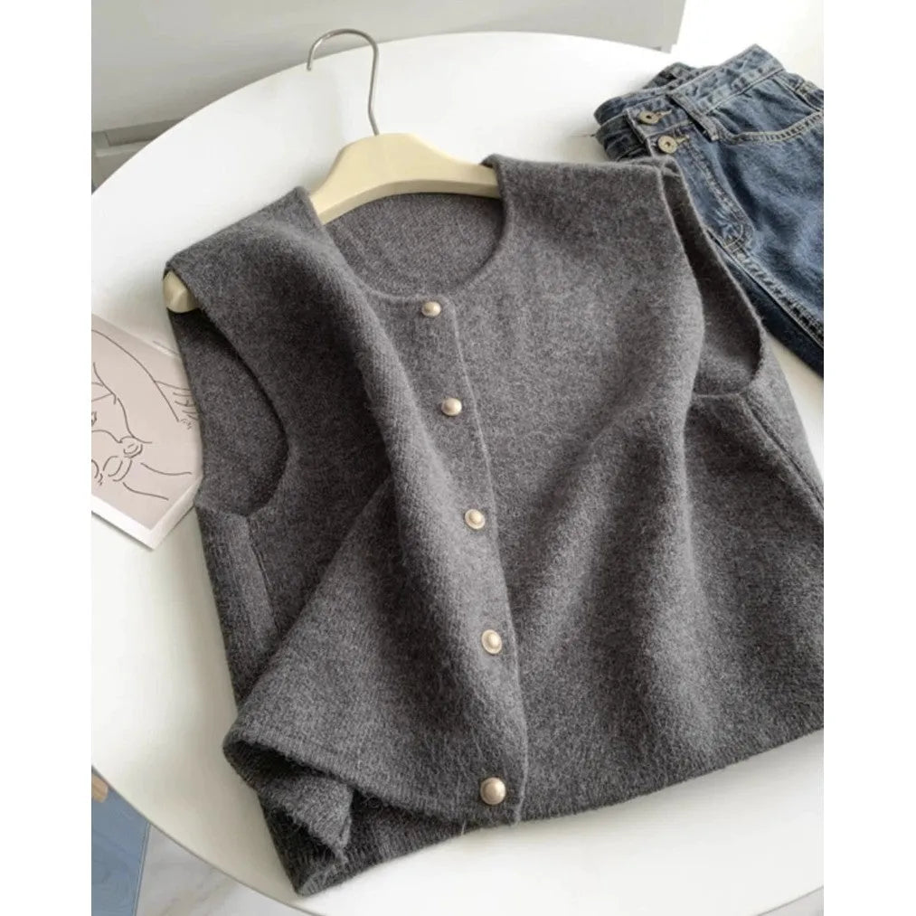 Women's casual polyester pullover in Angora red with half-length sleeves on a hanger.