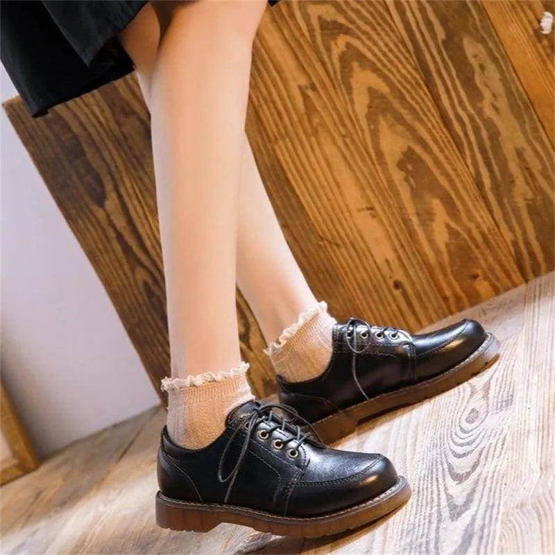 Women's black retro Mary Jane pumps shoes with low square heel and front lace-up design