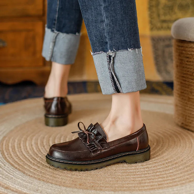 British style women's round head leather shoes with a chunky flat heel in black or brown.