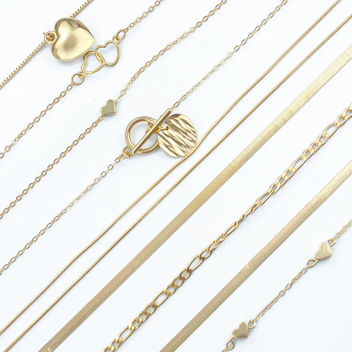Gold women's necklace set of 10 pieces with snake bone chains and adjustable length
