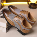 Men's black houndstooth plaid casual shoes with square toe and lace-up front on a rubber sole.