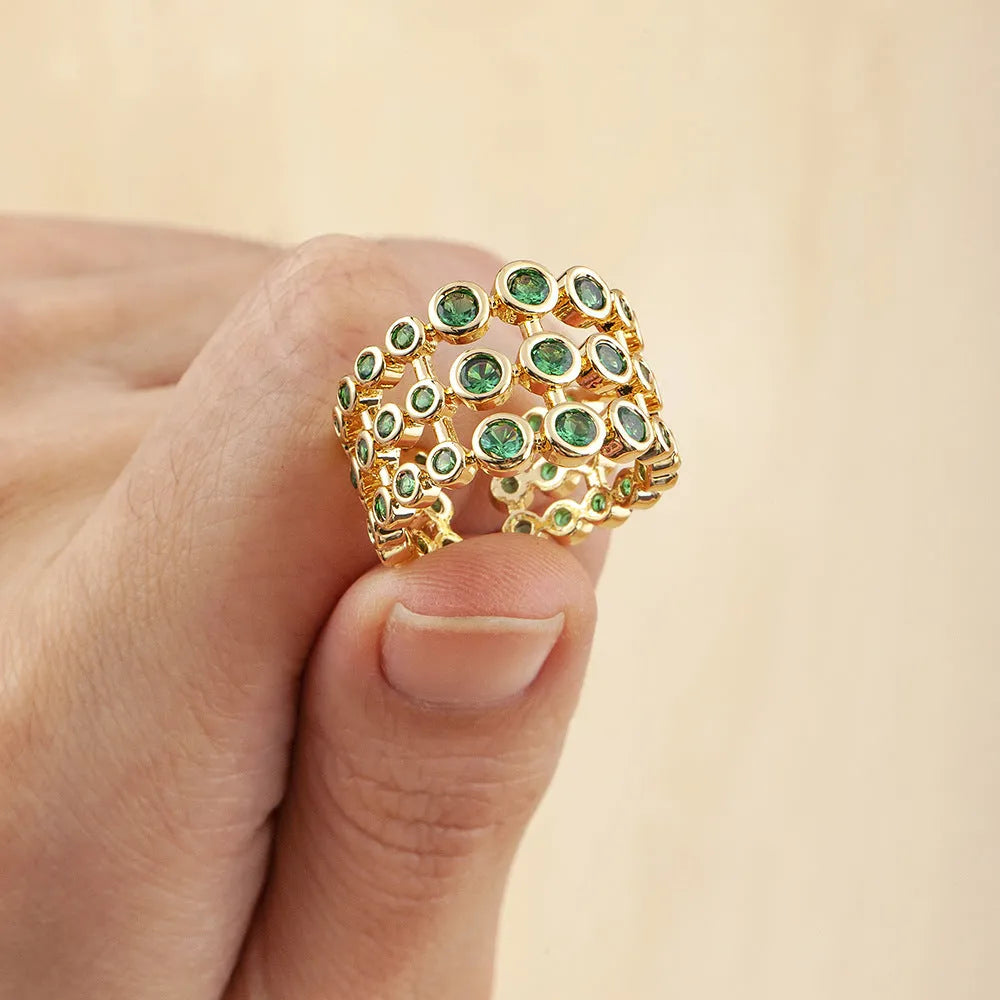 Copper ring with 18K gold plating and green zircon on exaggerated wide three-layer band
