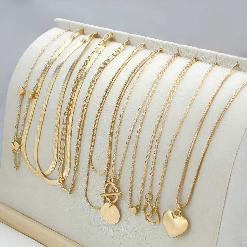 Gold women's necklace set of 10 pieces with snake bone chains and adjustable length