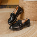 British style women's round head leather shoes with a chunky flat heel in black or brown.