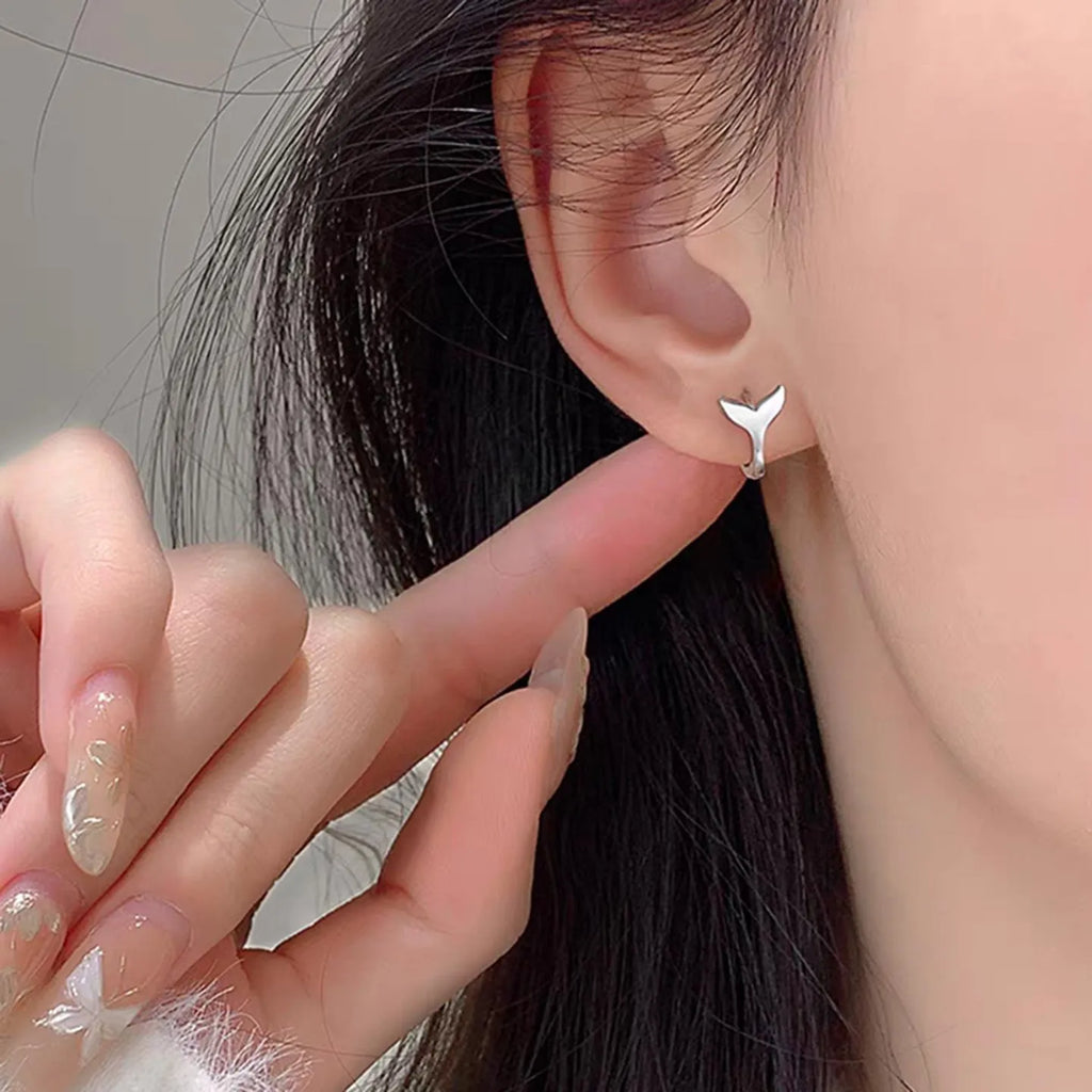 Women's fishtail earrings in electroplated copper with white gold or yellow gold finish