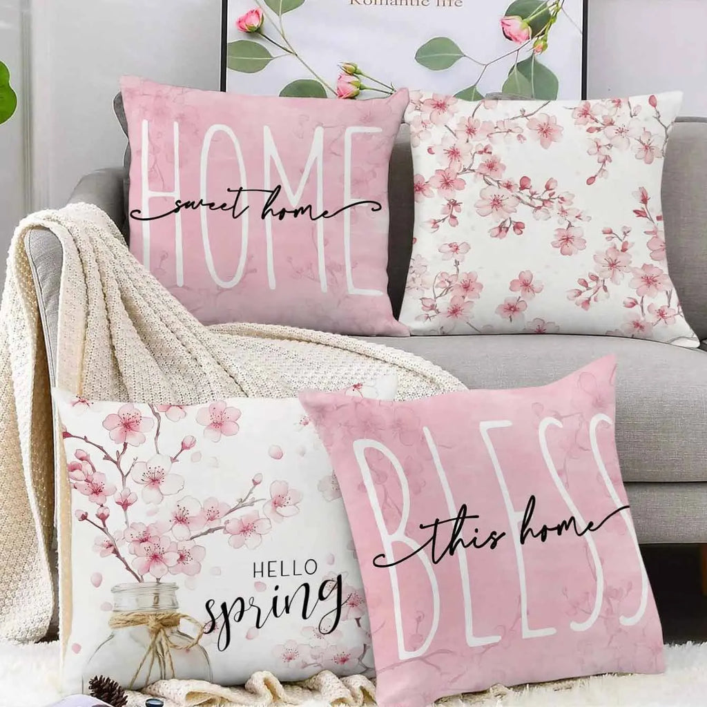 Square short velvet cushion cover with pink cherry blossom and letter print, 45cm.