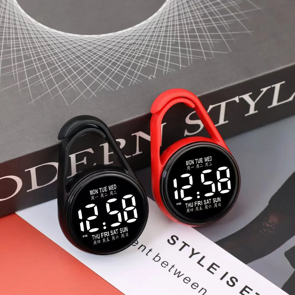 LED electronic watch with luminous week display in multiple colour options including black white pink green blue red grey