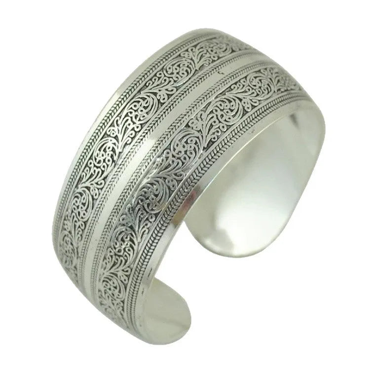 Ethnic carved open bracelet with Miao silver style in turtle colour showing Roman-inspired shape