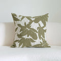 Green striped and botanical patterned cotton linen decorative pillow with tassel detail.
