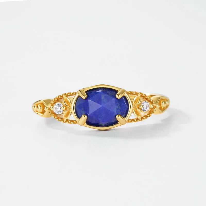 Japanese style geometric silver-tone alloy ring with a blue Lapis Lazuli ellipse stone.