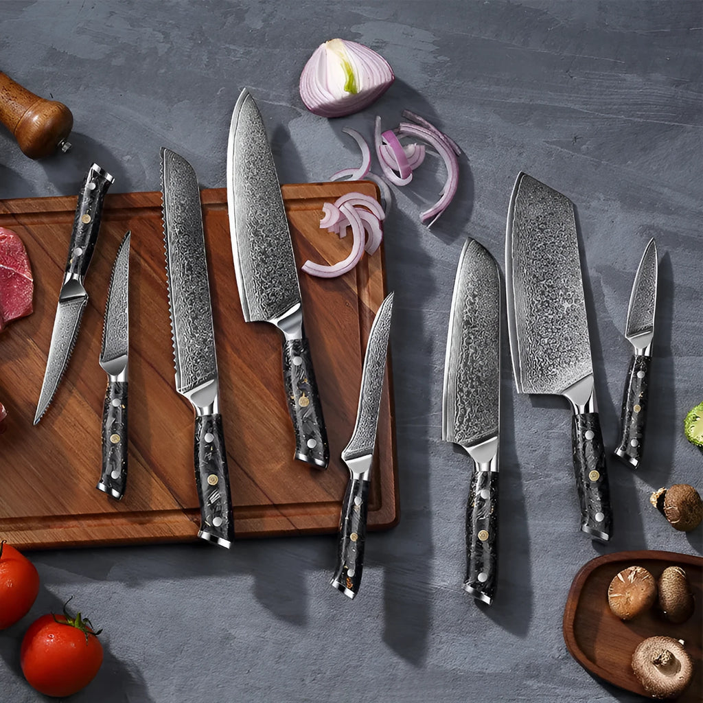 Eight-piece Damascus steel kitchen knife set with fishbone pattern, showing chef, utility, boning, steak, and fruit knives.