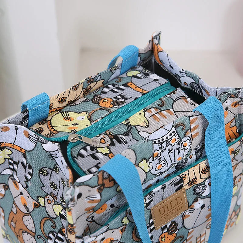 Women's printed canvas tote bag with aluminium frame in floral and animal print designs