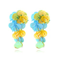 Women's exaggerated handmade string bead floral earrings in mixed materials, showing colourful, rose, and purple colour options.