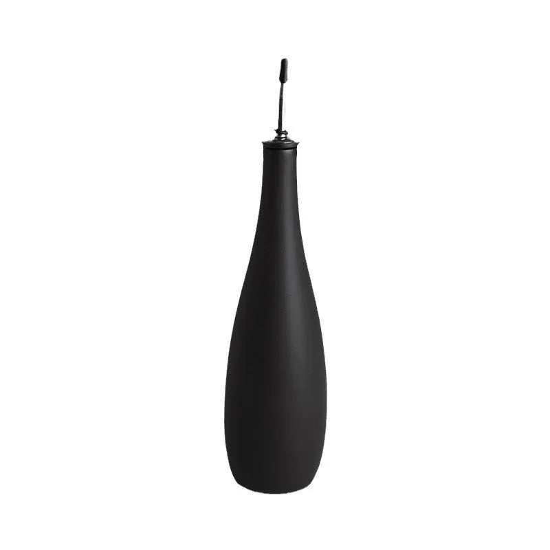 Ceramic oil pot with integrated brush and conical funnel design