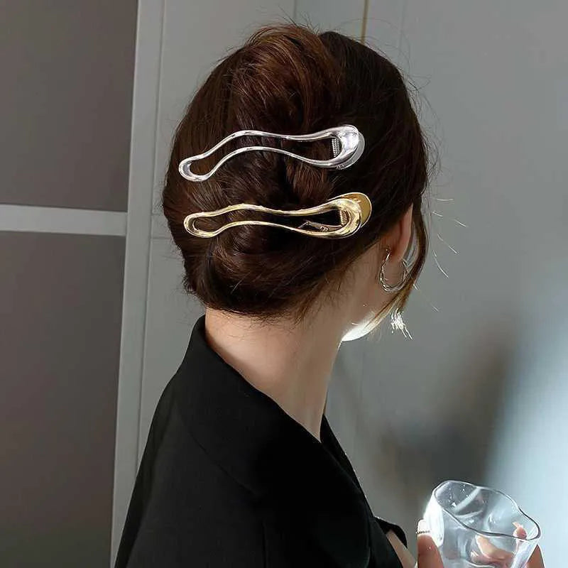 Women's zinc alloy barrettes in gold and silver finishes showing square, arc, and triangle shapes