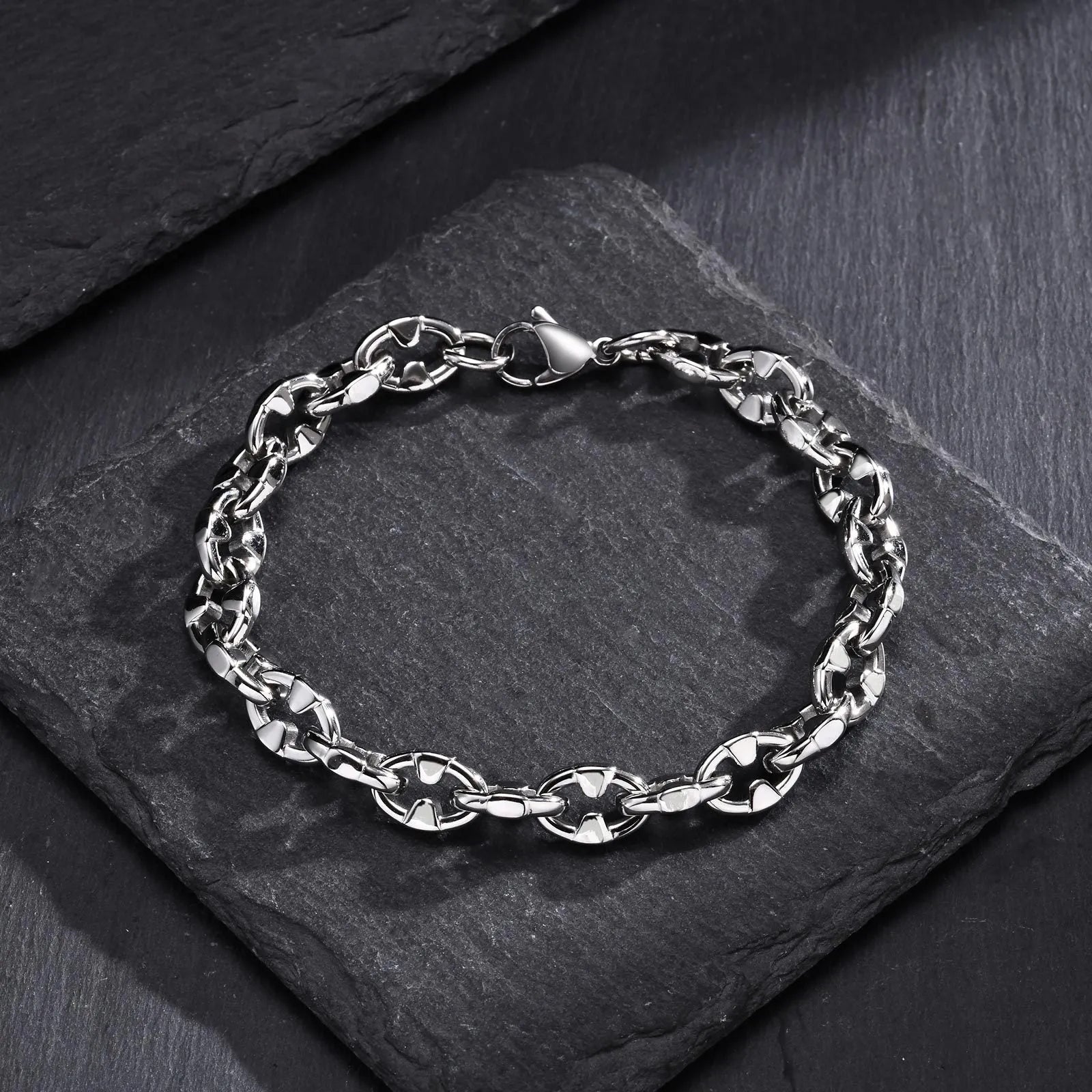 Handmade thick stainless steel geometric chain bracelet with a polished steel colour finish