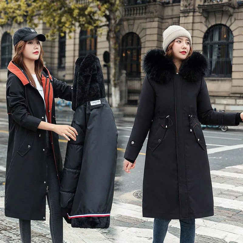 Women's white cotton-padded trench coat with two-way zip showing extended 100cm length and long sleeves