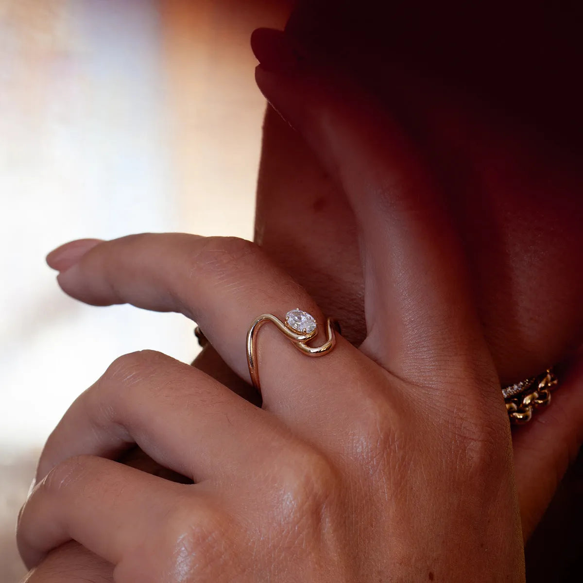 Geometric titanium steel ring with zircon stones in a silver-tone finish.
