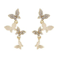 Women's gold colour copper butterfly drop earrings with four-butterfly design