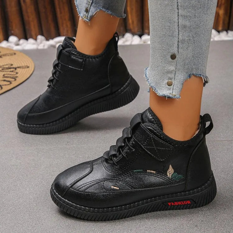 Women's black velvet cotton shoes with non-slip rubber soles showing low tube sock design