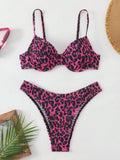 Women's leopard print backless bikini in brown mixed colour on a mannequin.