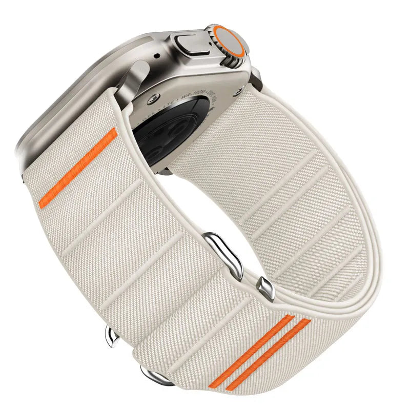 Elastic nylon Apple Watch band with stainless steel buckle shown in multiple colour options.