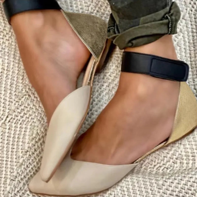Women's beige velcro sandals with a hollowed PU upper and flat heel.